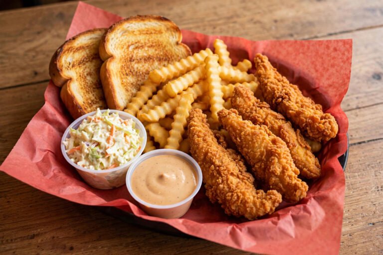 Is Raising Cane's Halal - chicken finger box combo with fries, Texas toast, coleslaw and Cane's Sauce